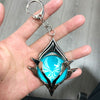 Deluxe Genshin Impact Snezhnaya Metal KeyChain - Zxsetup